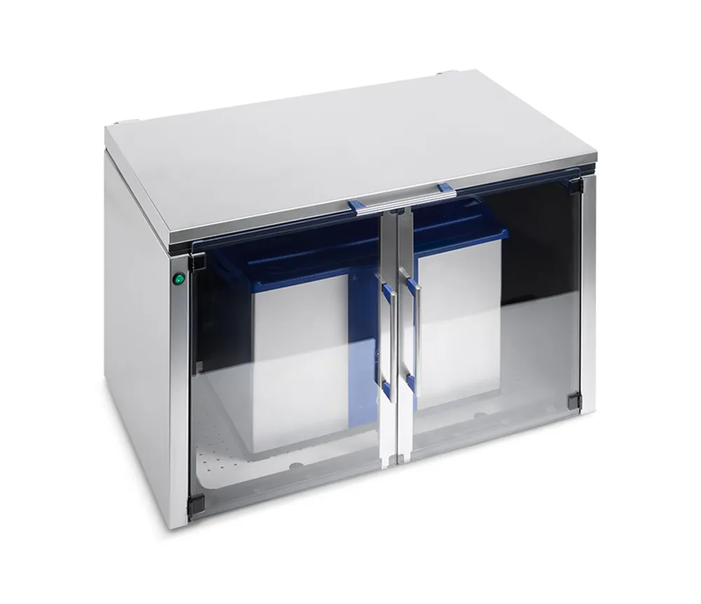 Stainless steel sound-dampening box with clear glass doors, holding two white tanks with blue rims.